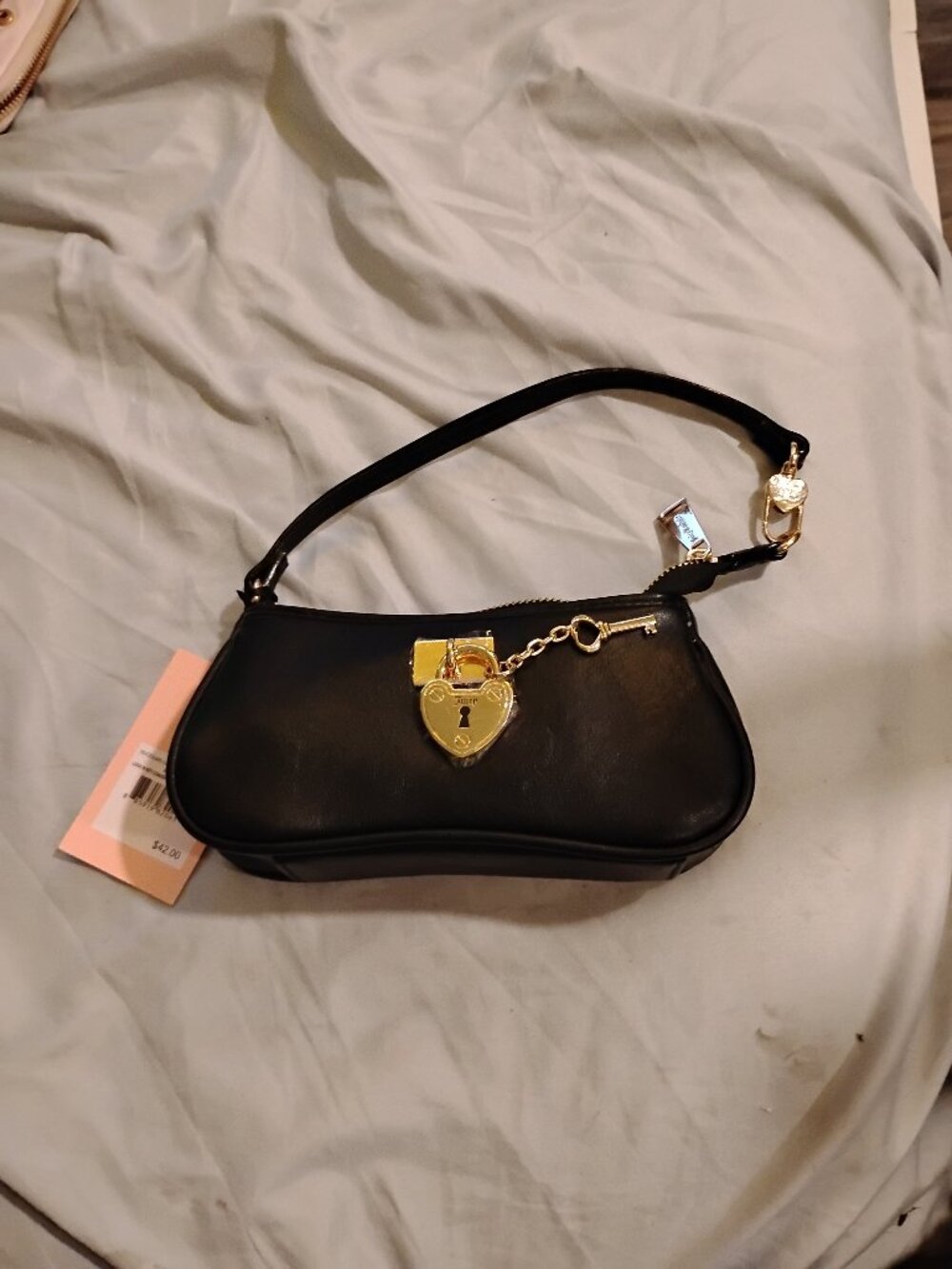 Juicy Couture Lock N Key Convertible Baguette Wristlet/Clutch in Liquorice black